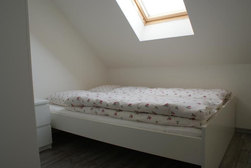 Postel nebo postele na pokoji v ubytování Guest House K74