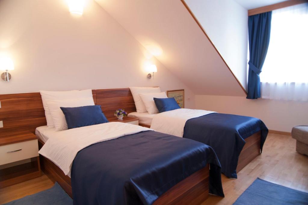 Postel nebo postele na pokoji v ubytování Palma Rooms B&B