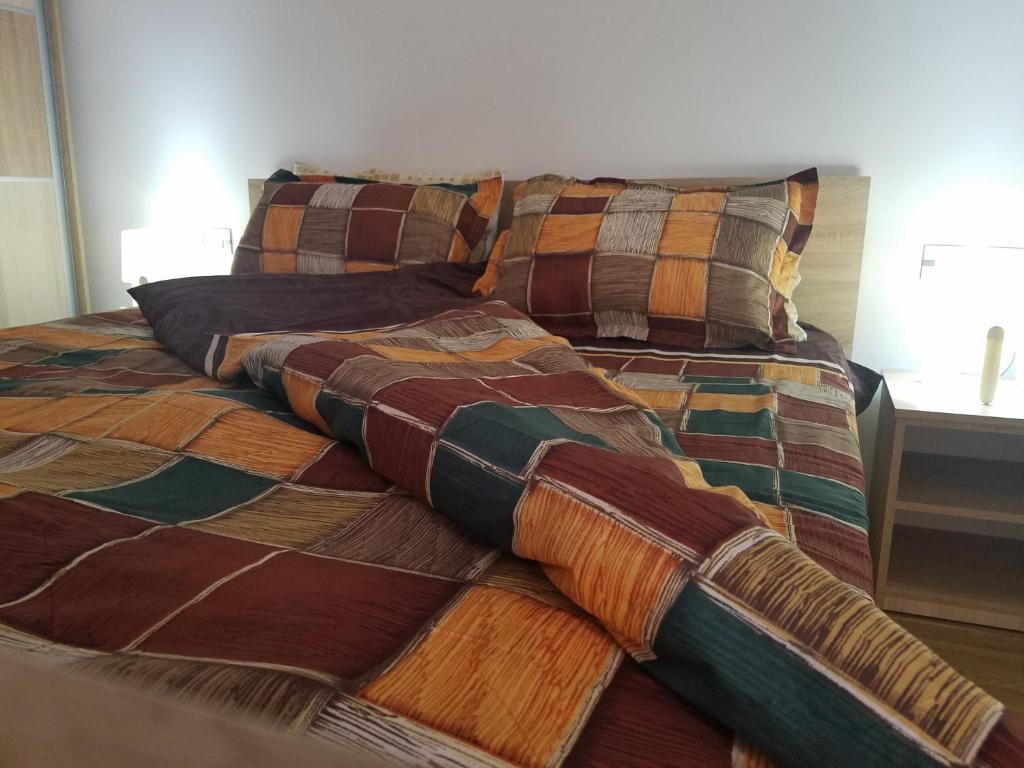 Postel nebo postele na pokoji v ubytování Apartment Invictus Mavrovo