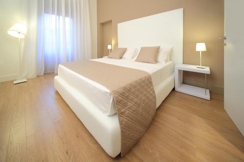 Postel nebo postele na pokoji v ubytování Al Castello Luxury B&B