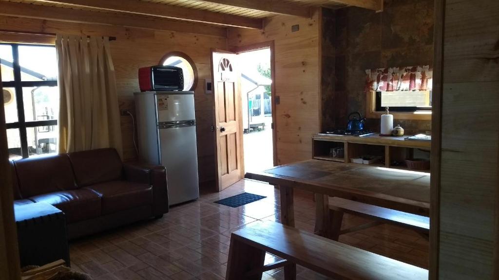 Kuchyň nebo kuchyňský kout v ubytování HelChiloé Cabañas