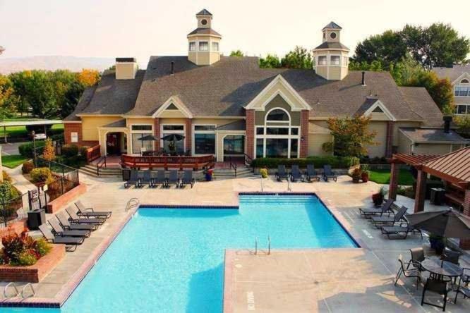 a large house with a large swimming pool at The Huntington in Boise