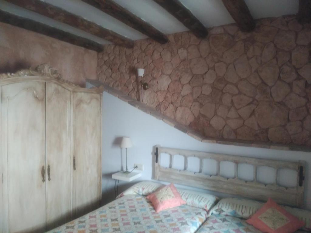 Postel nebo postele na pokoji v ubytování El Sueño de Lucrecia