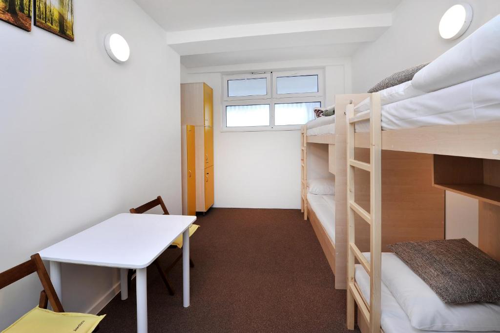 Postel nebo postele na pokoji v ubytování Bel Hostel