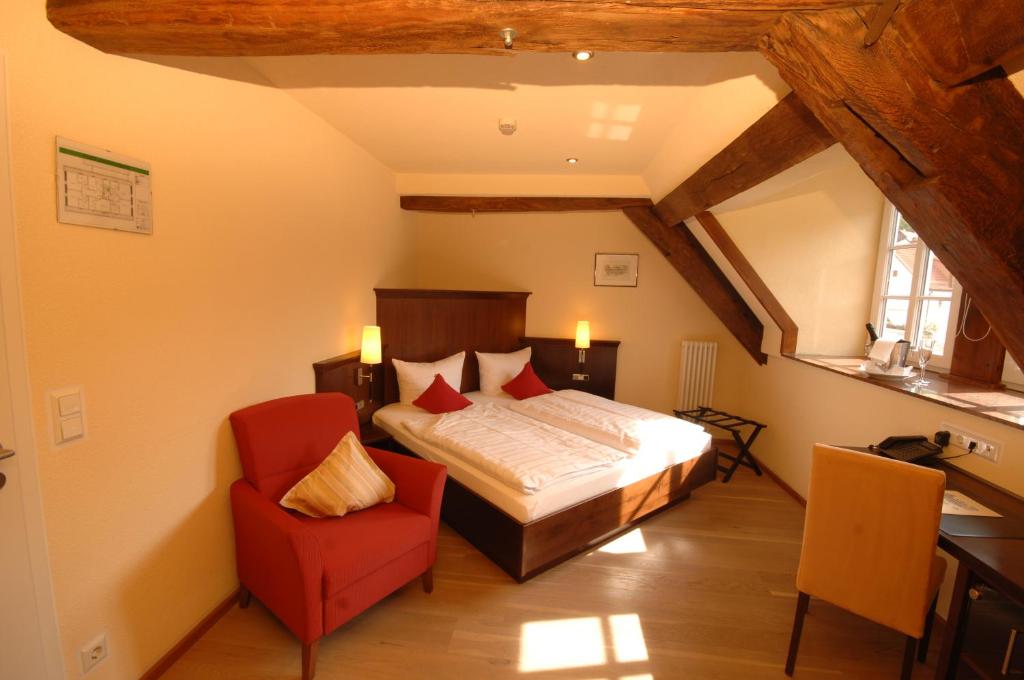 Postel nebo postele na pokoji v ubytování Hotel Restaurant Ölmühle