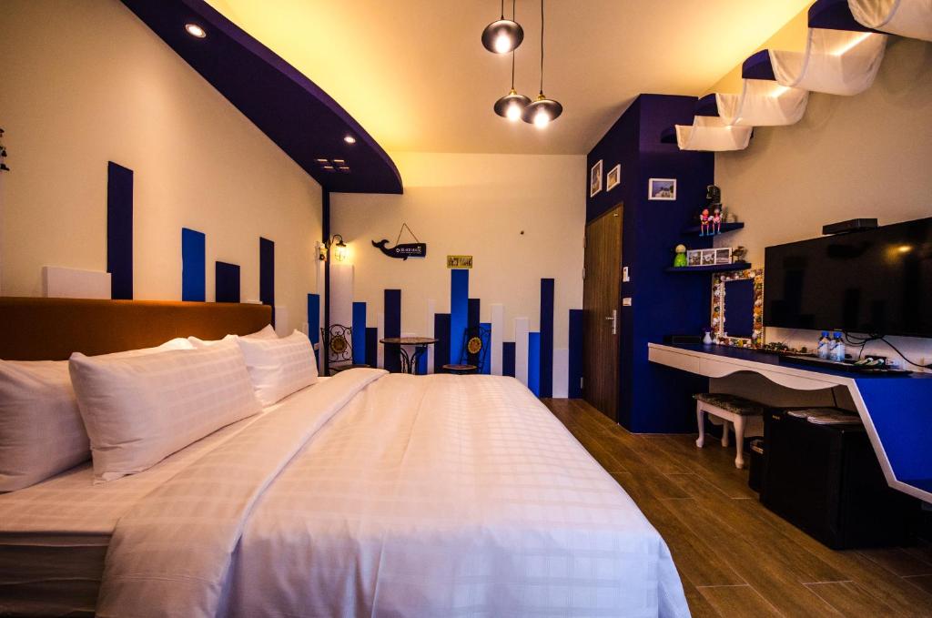 Postel nebo postele na pokoji v ubytování Summer Bay Inn