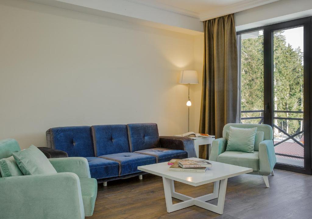 Posezení v ubytování Kokhta Plaza Boutique Hotel