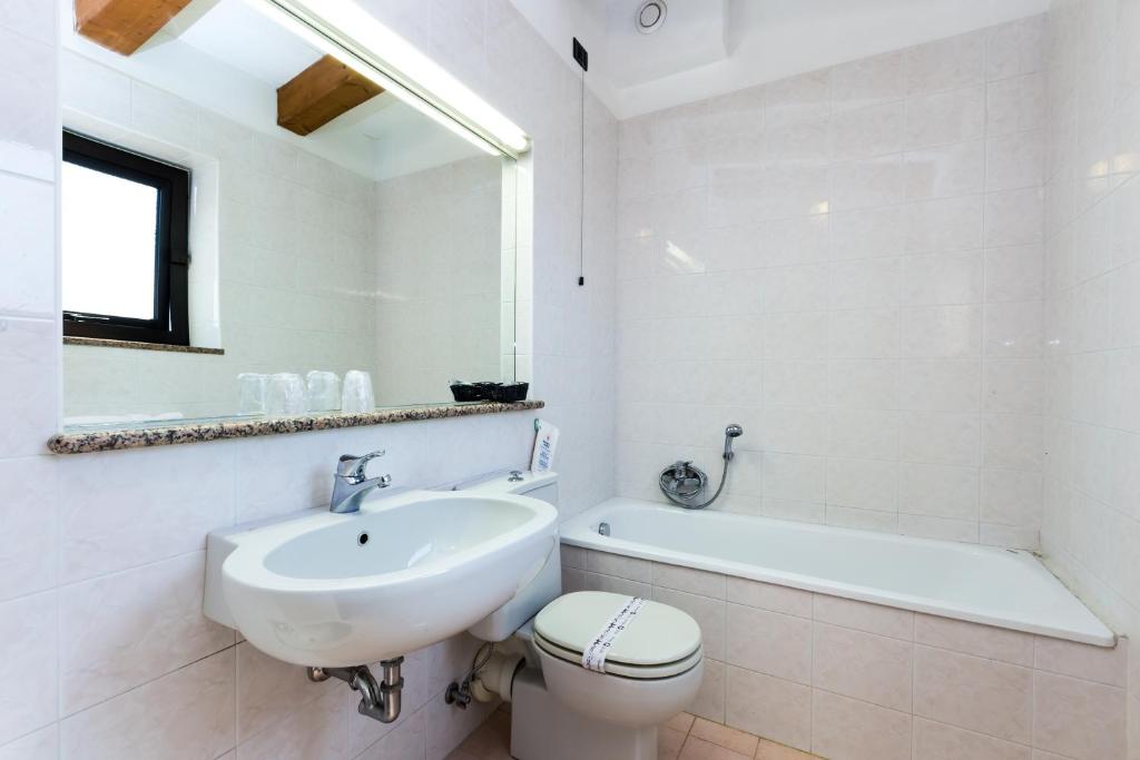 Koupelna v ubytování Hotel Adria