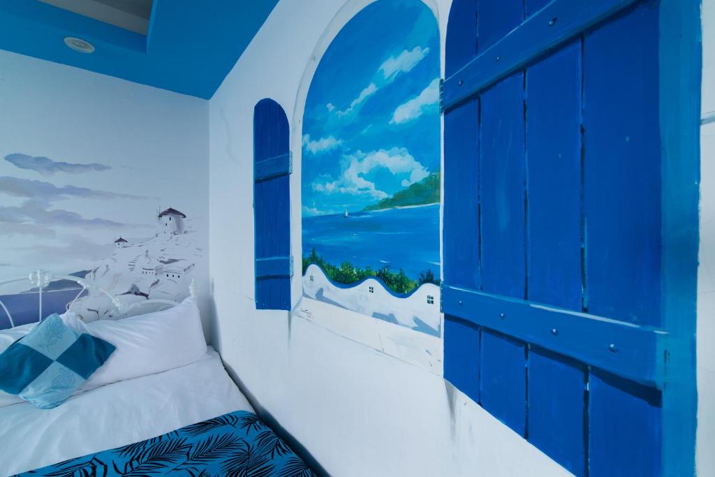 Postel nebo postele na pokoji v ubytování Shengtuolini B&B