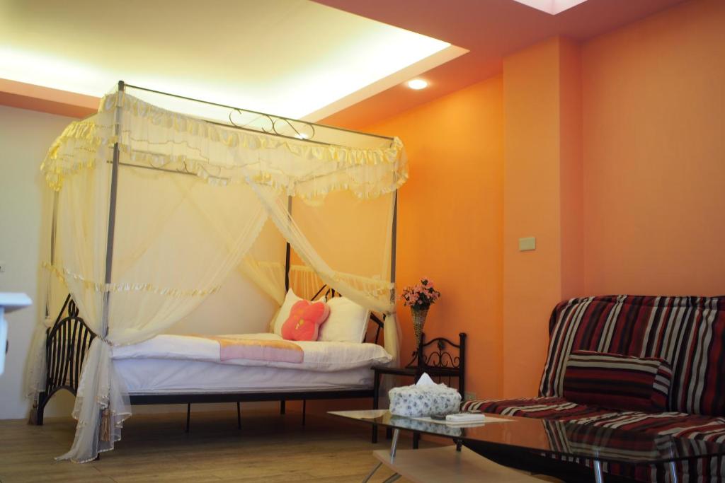 Postel nebo postele na pokoji v ubytování Shengtuolini B&B