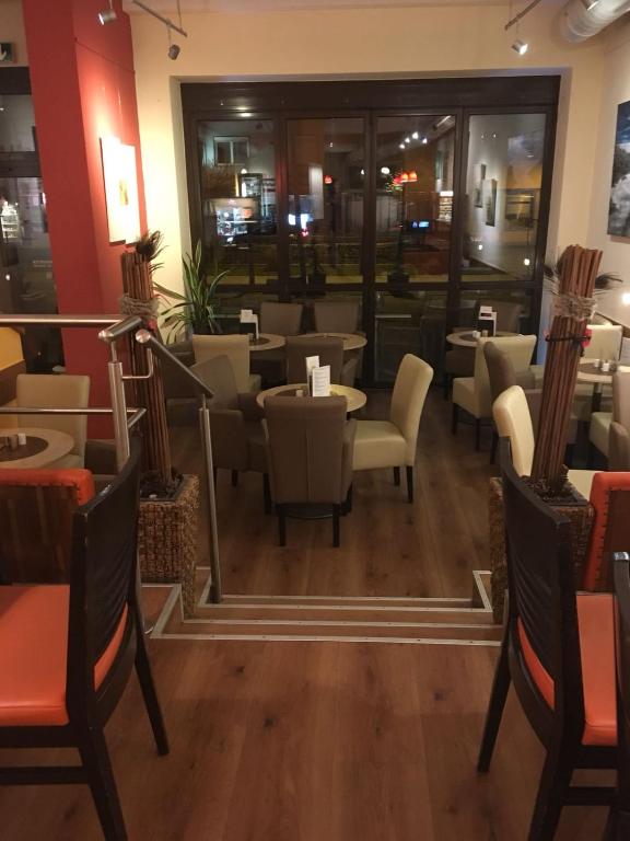 Posezení v ubytování Kunstcafe Rooms