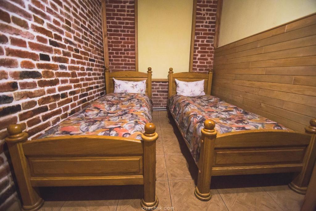 Postel nebo postele na pokoji v ubytování SAMARIANKA hotel