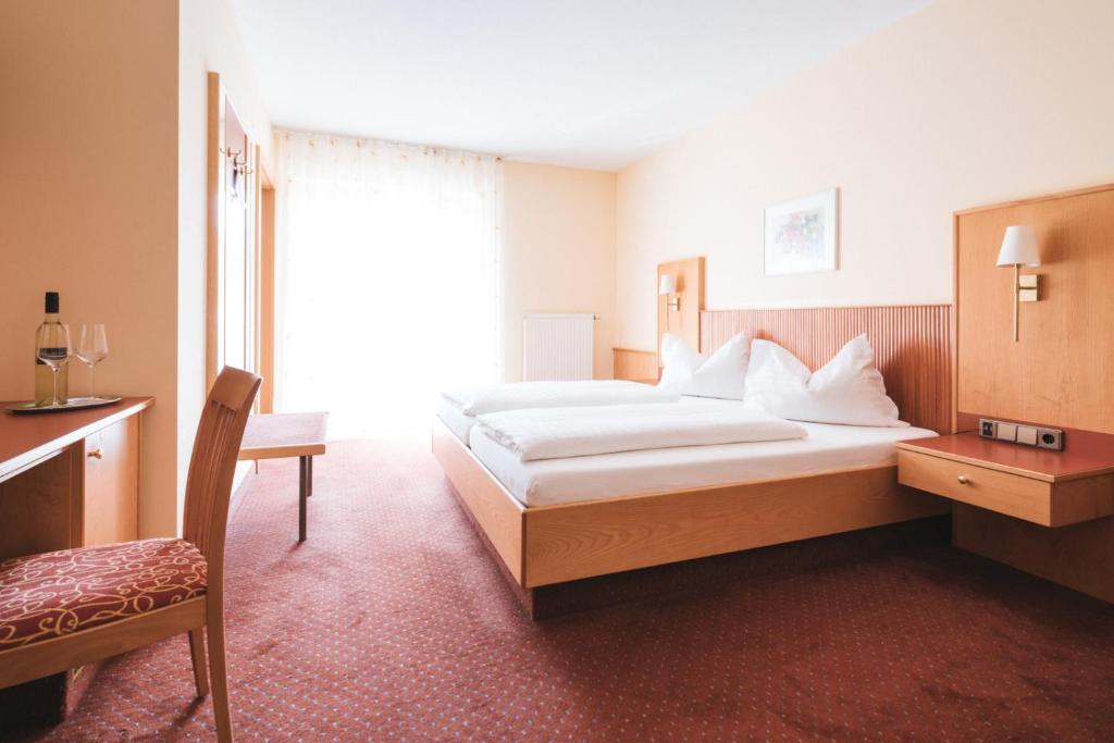 Voodi või voodid majutusasutuse Hotel am Marktplatz - Landgasthof Wratschko - Gamlitz toas