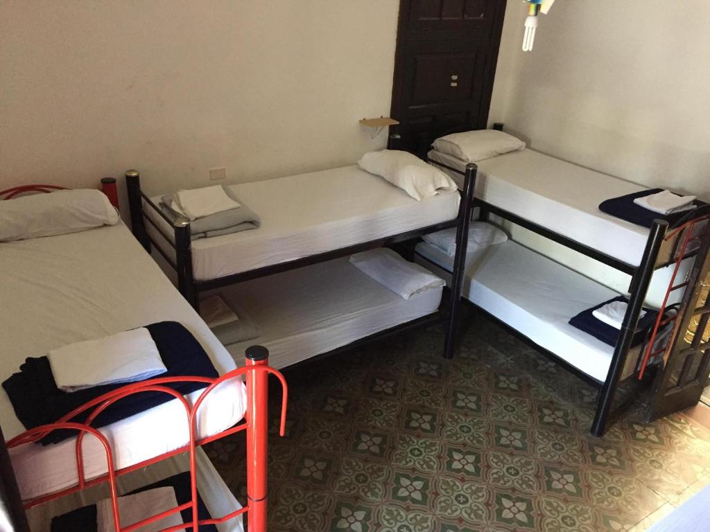 Postel nebo postele na pokoji v ubytování Rivera Hostel Córdoba