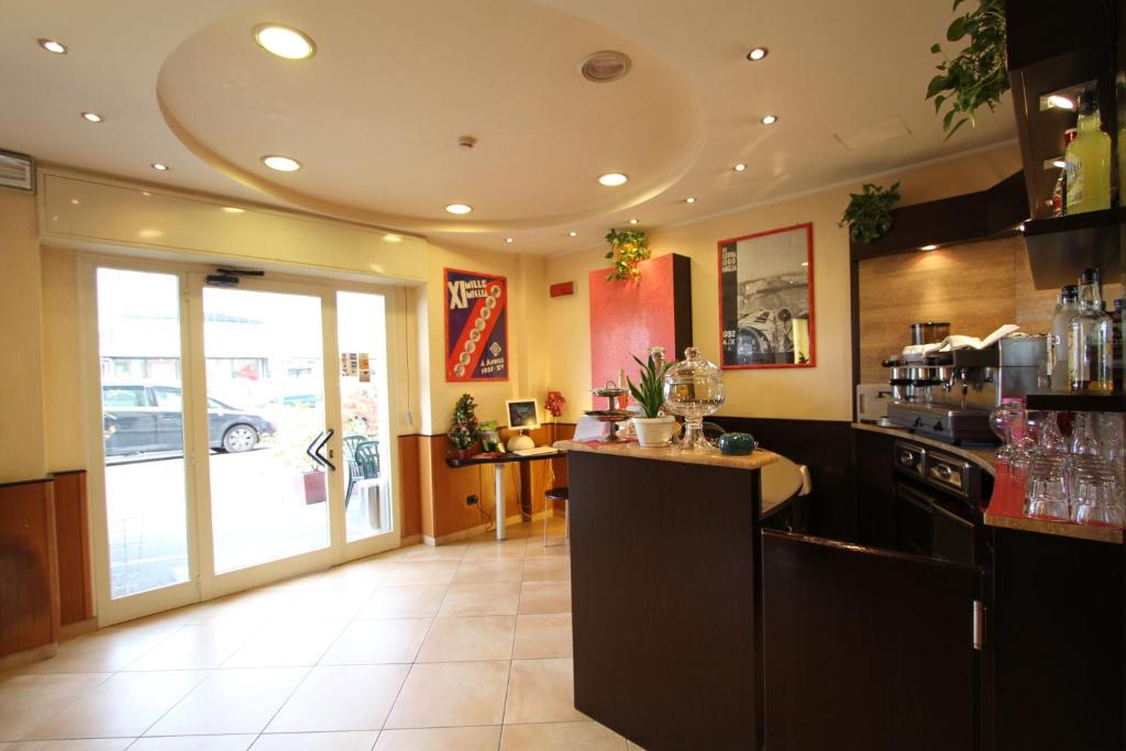 A kitchen or kitchenette at Hotel Della Volta