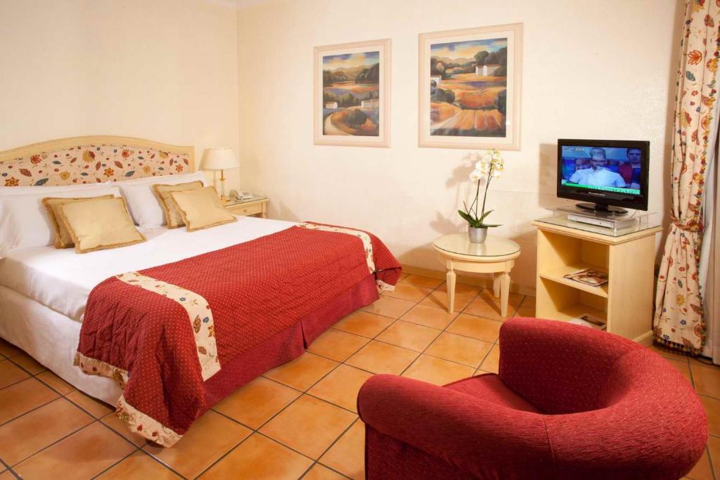 Uma cama ou camas num quarto em Hotel Piccolo Borgo