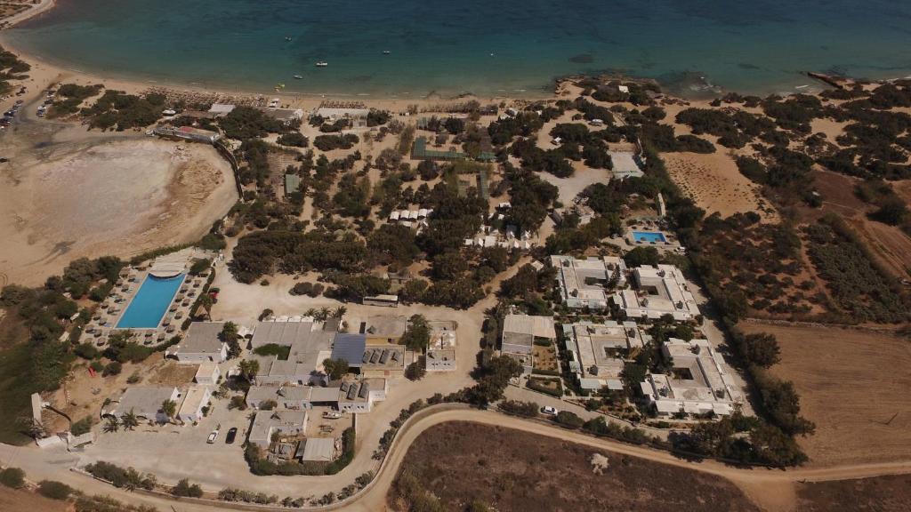 an aerial view of a resort next to the beach at Surfing Beach Village Paros in Santa Maria