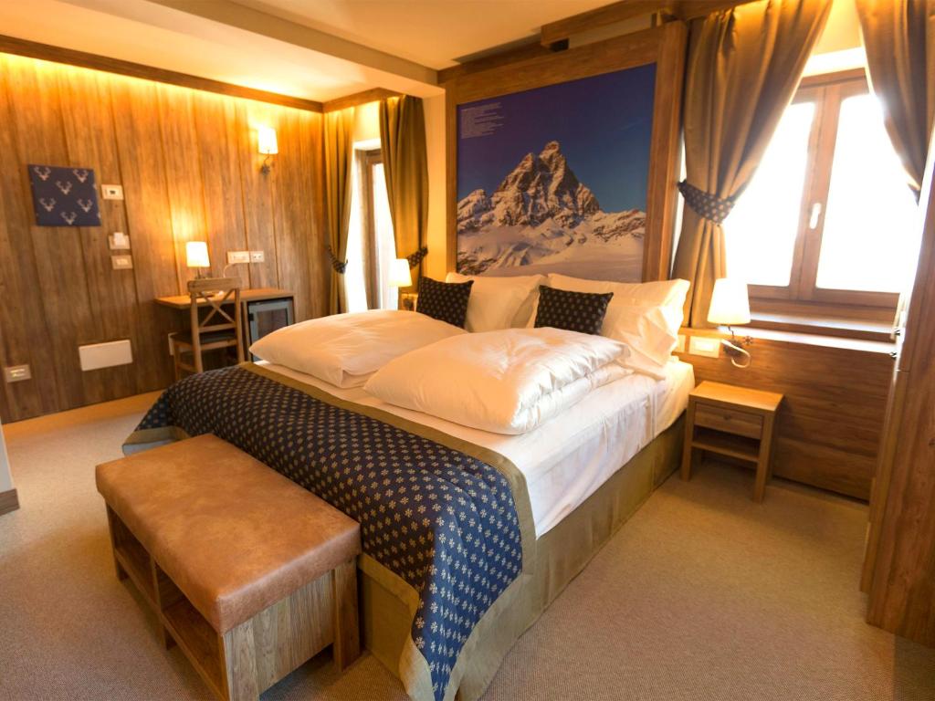 Postel nebo postele na pokoji v ubytování Hotel Marmore