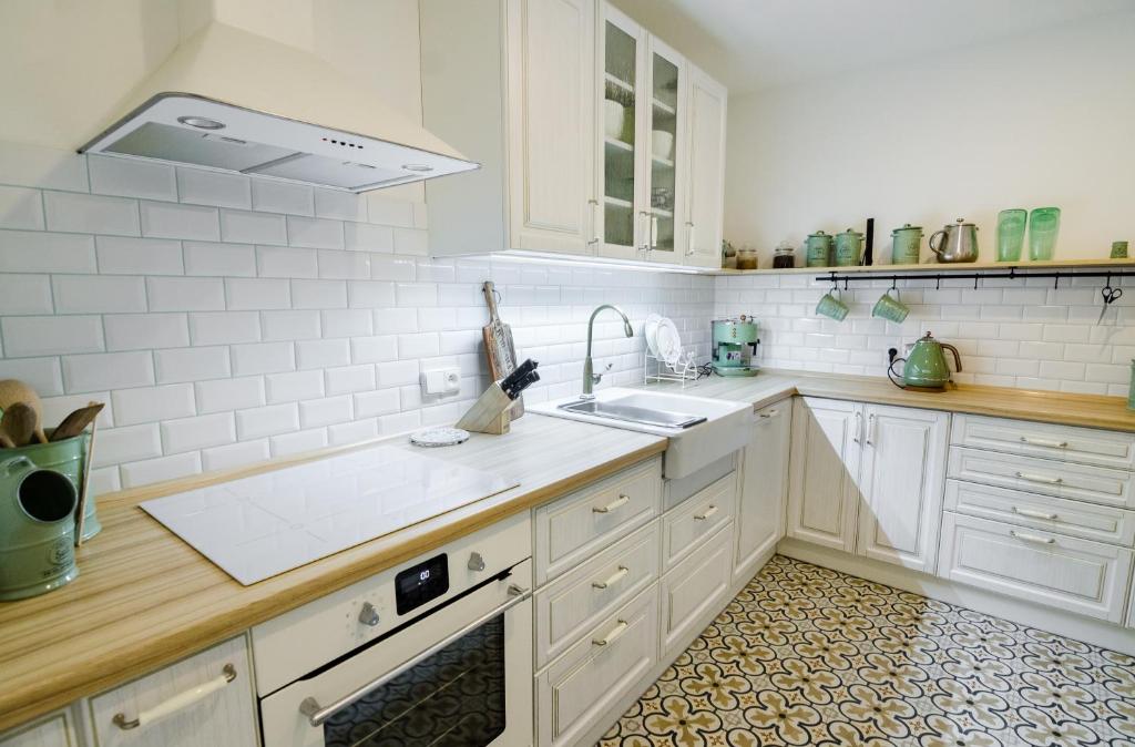 Kuchyň nebo kuchyňský kout v ubytování Guesthouse SaM