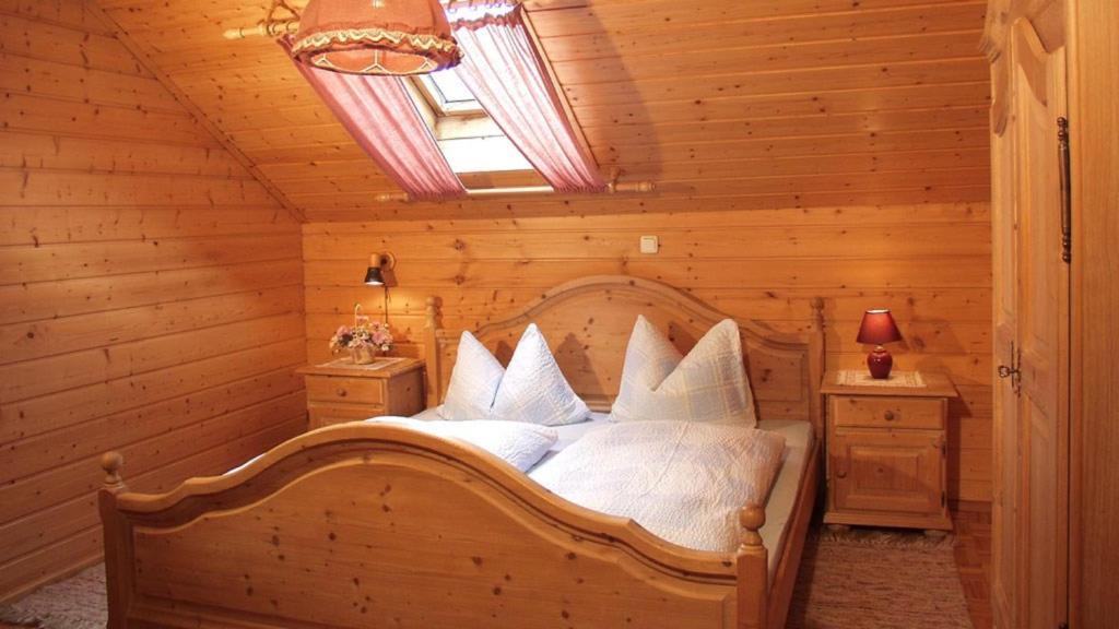 Postel nebo postele na pokoji v ubytování Huisnhof