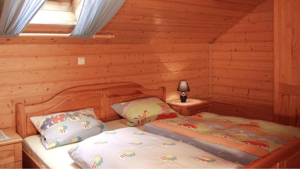 Postel nebo postele na pokoji v ubytování Huisnhof