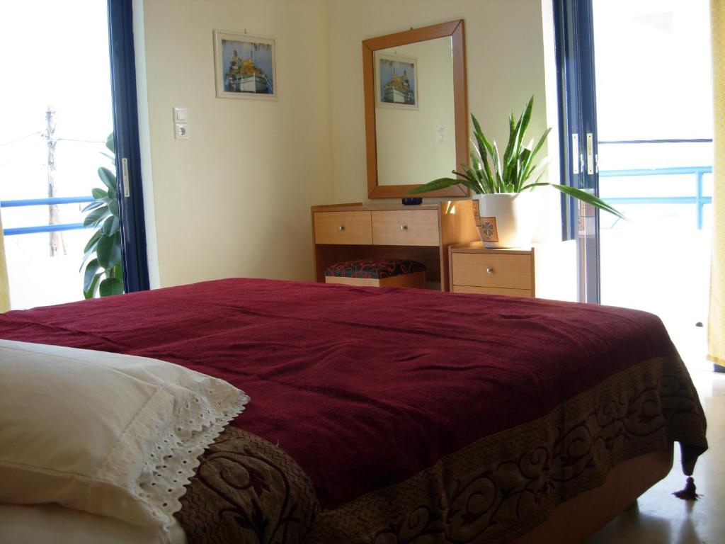 Postel nebo postele na pokoji v ubytování Philippos Studios & Apartments