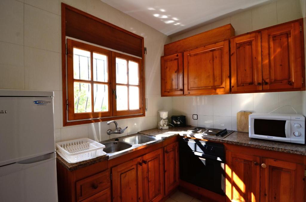 Kuchyňa alebo kuchynka v ubytovaní Casa la Flor