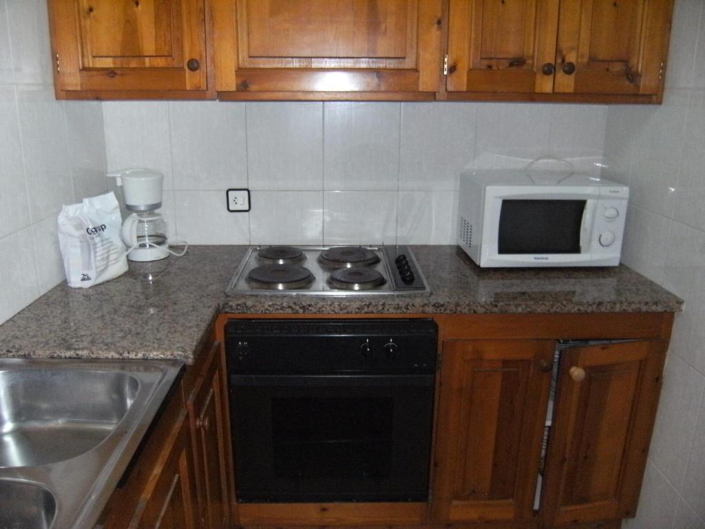 Kuchyňa alebo kuchynka v ubytovaní Casa la Flor