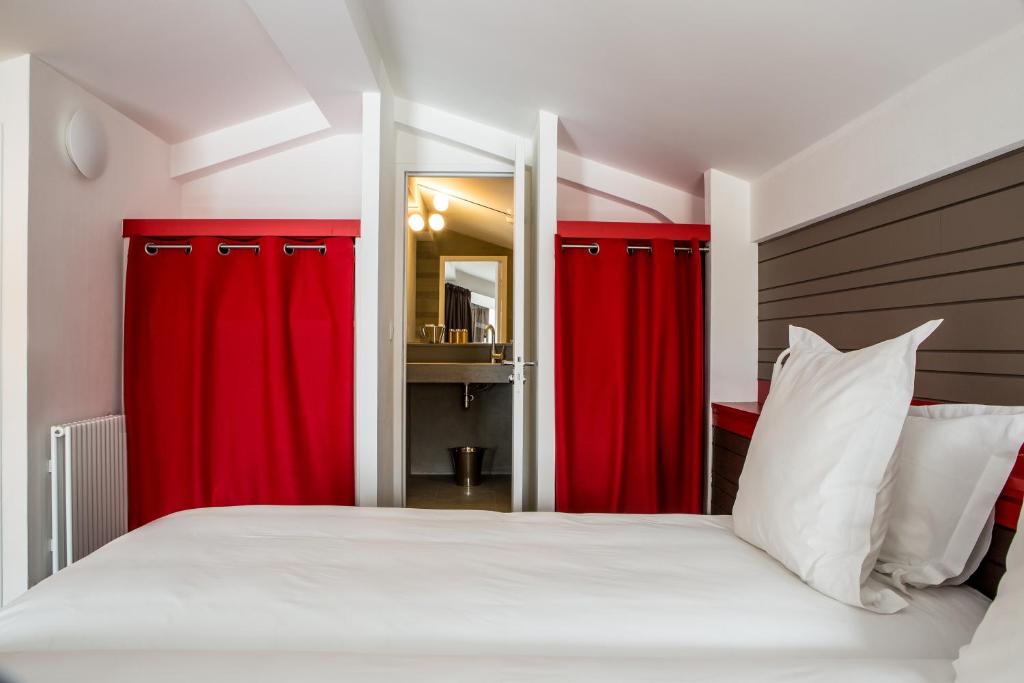 Postel nebo postele na pokoji v ubytování Hotel Ormelune