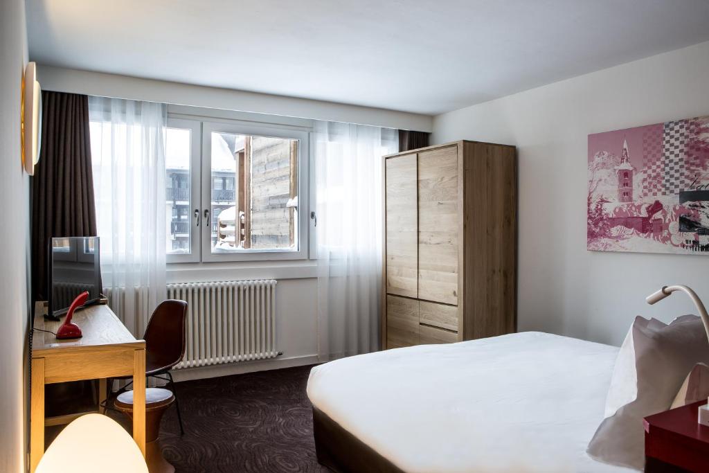 Postel nebo postele na pokoji v ubytování Hotel Ormelune