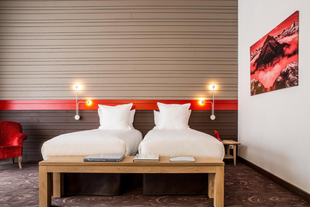 Postel nebo postele na pokoji v ubytování Hotel Ormelune