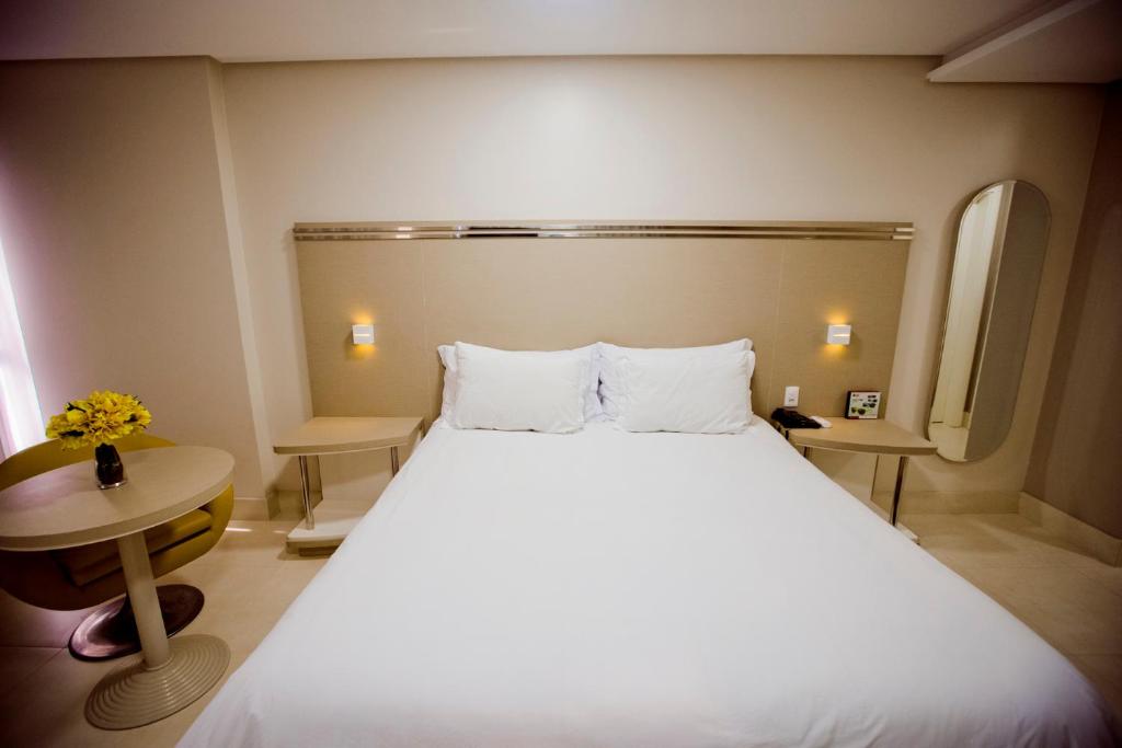 Postel nebo postele na pokoji v ubytování Hotel San Pietro