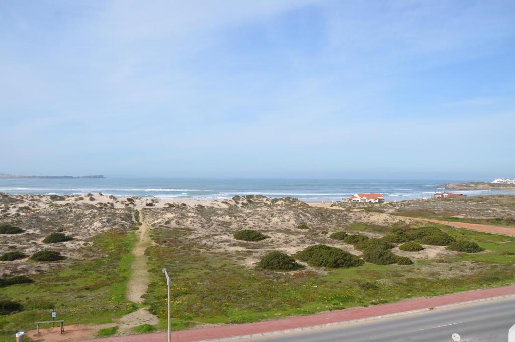a view of the ocean and a road at Baleal Tower Bay Apartment in Ferrel