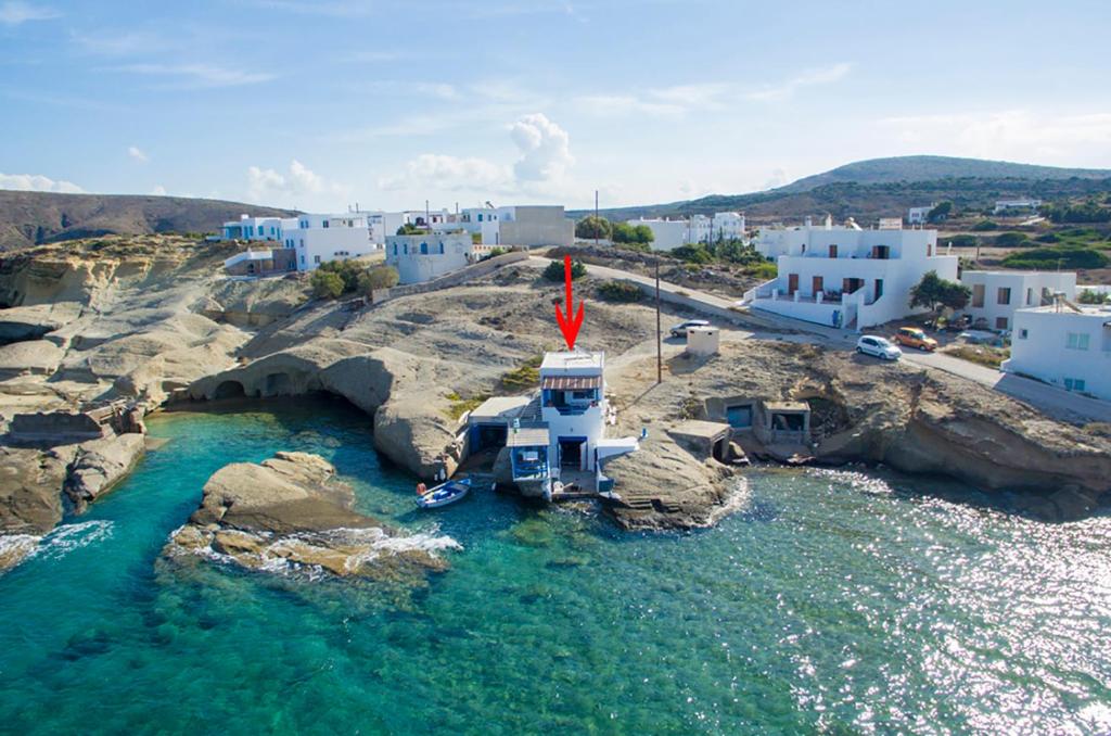 an aerial view of a small island in the water at Fisherman's Syrma House in Pachaina