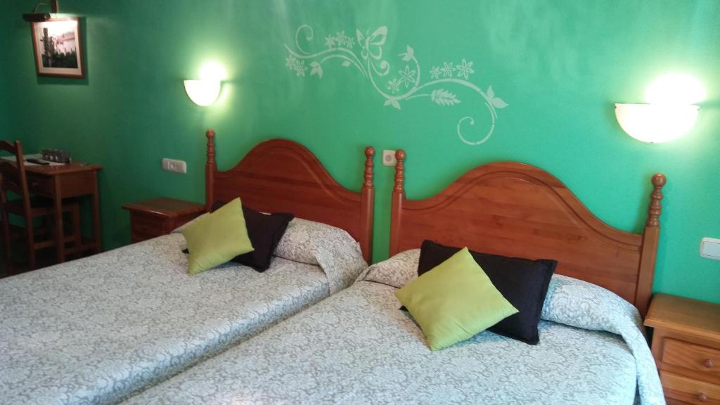 Postel nebo postele na pokoji v ubytování Hostal Ekaitza