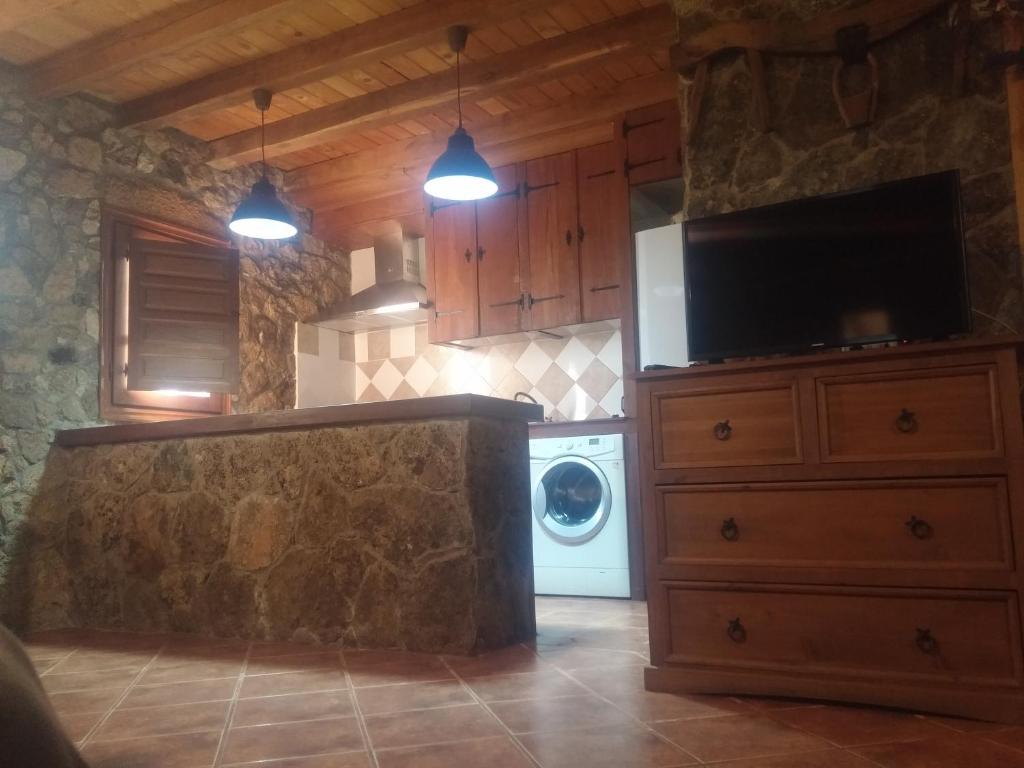 Kuchyňa alebo kuchynka v ubytovaní Casa Calañas