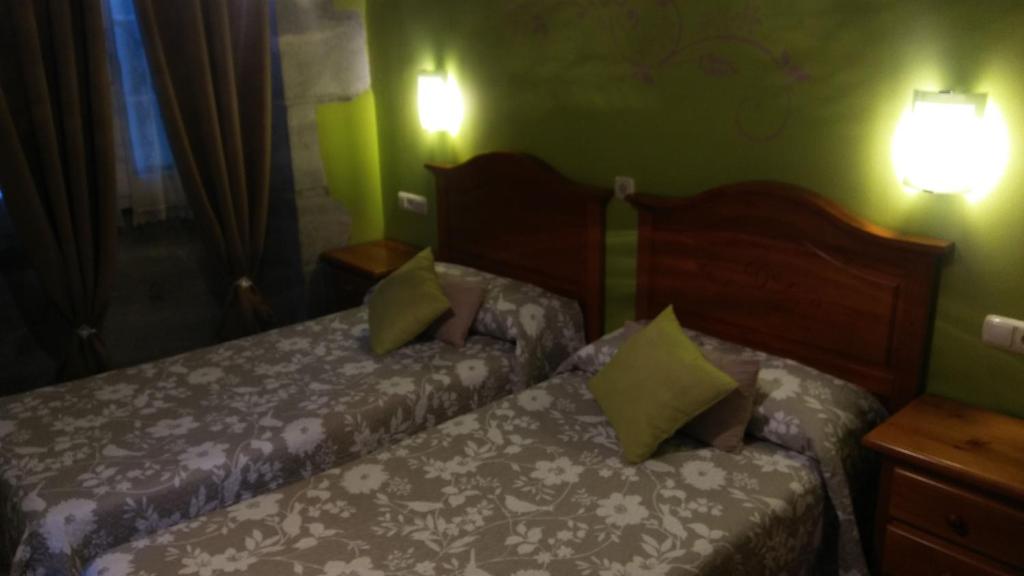 Postel nebo postele na pokoji v ubytování Hostal Ekaitza