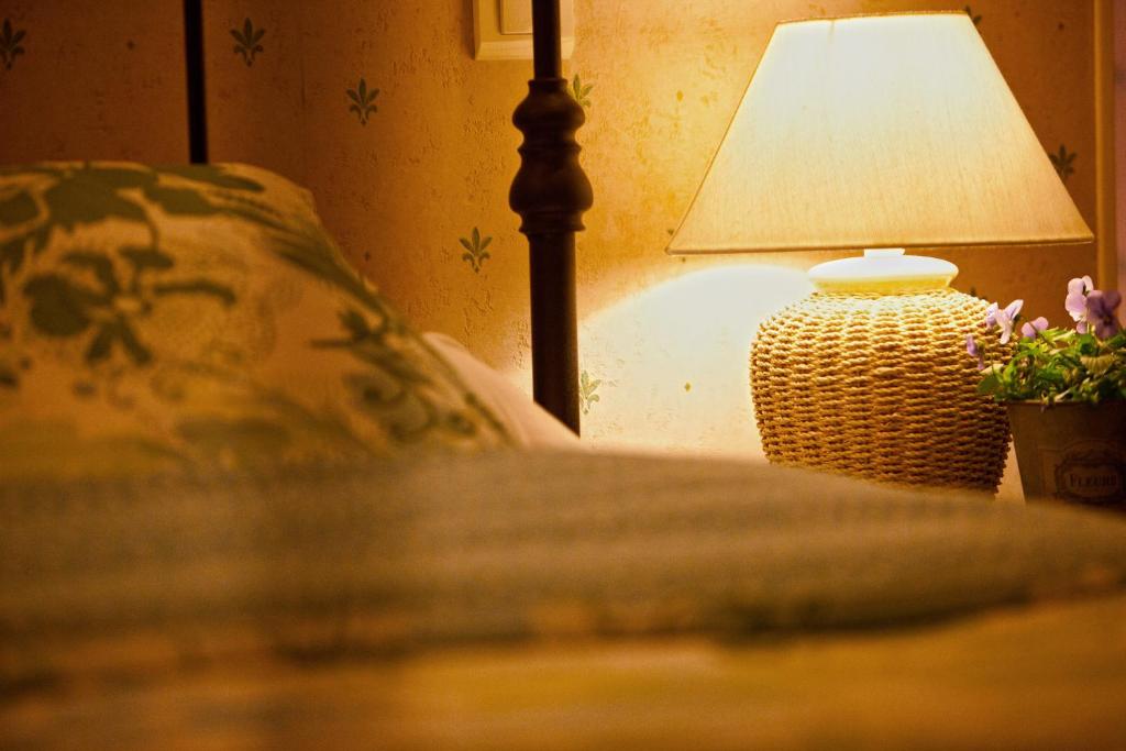Postel nebo postele na pokoji v ubytování La Fresnée chambres d'hôtes