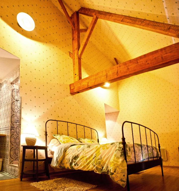 Postel nebo postele na pokoji v ubytování La Fresnée chambres d'hôtes