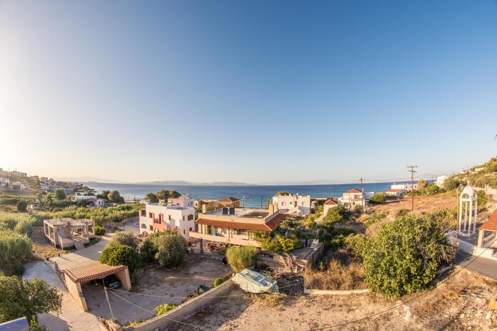 an aerial view of a village next to the ocean at Vagia Beach Apartments in Vaia