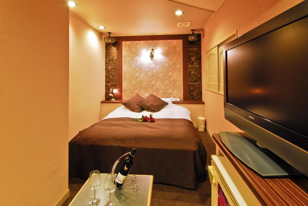 TV a/nebo společenská místnost v ubytování Hotel Joyseaside (Love Hotel)