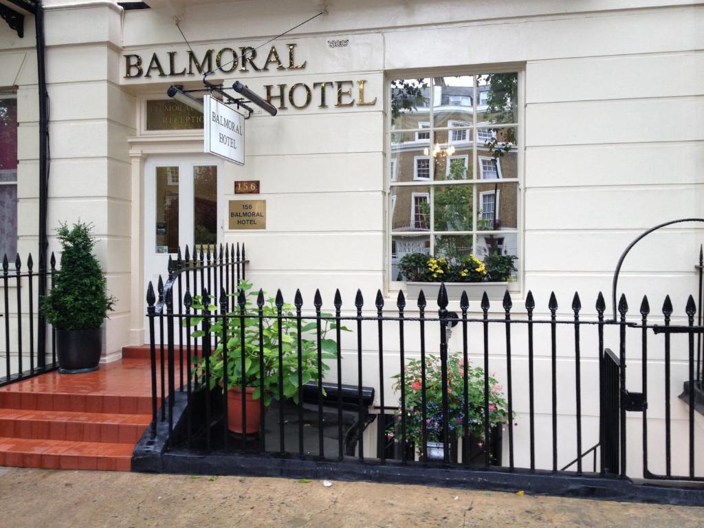 a black fence in front of a hotel at Balmoral House Hotel in London