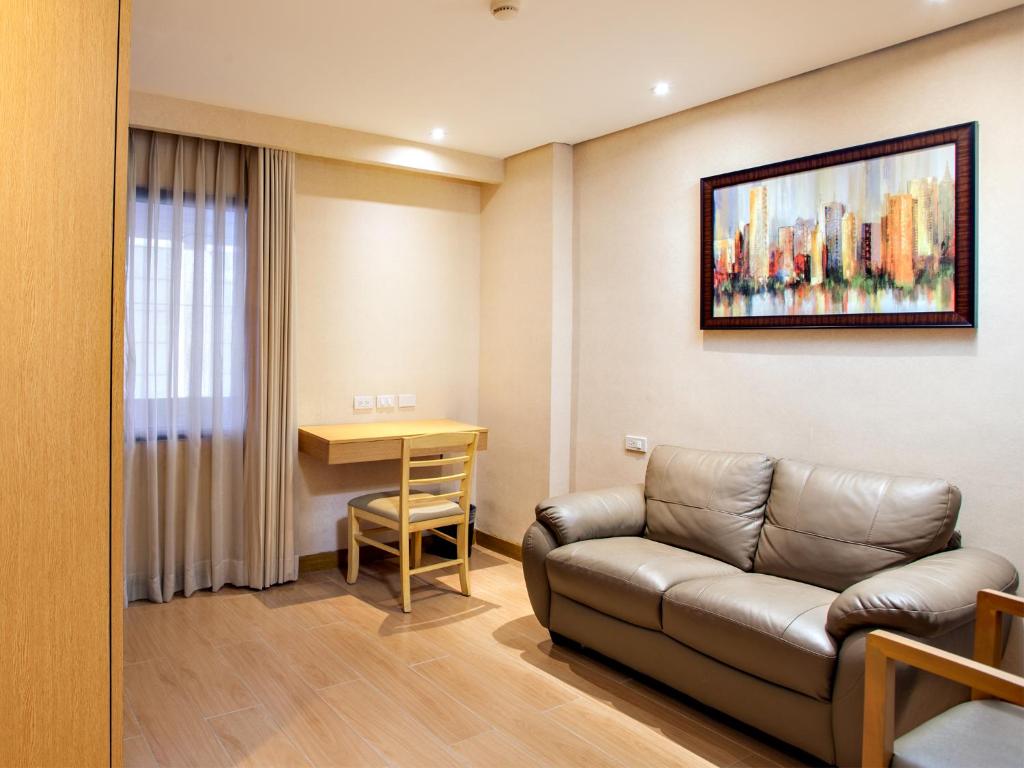 Posezení v ubytování Jinjiang Inn - Ortigas