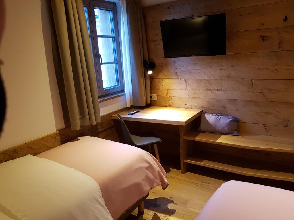 Postel nebo postele na pokoji v ubytování Hotel Vandot
