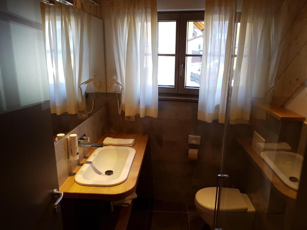 Koupelna v ubytování Hotel Vandot