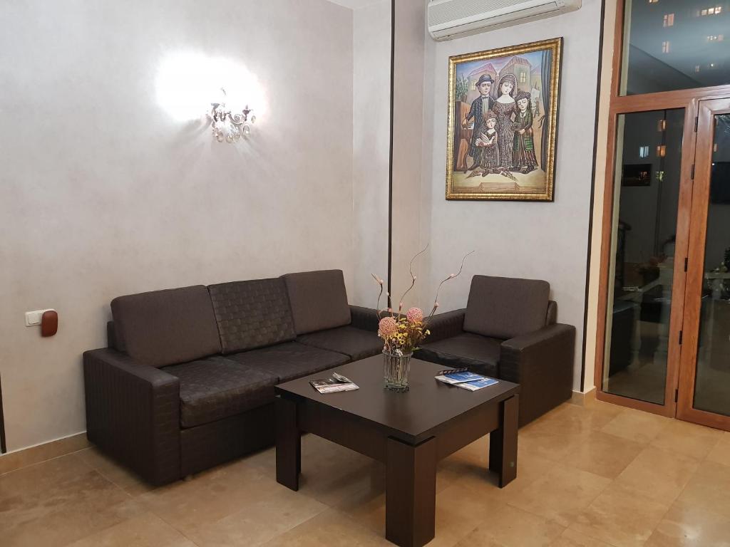 Posezení v ubytování Eridana Hotel