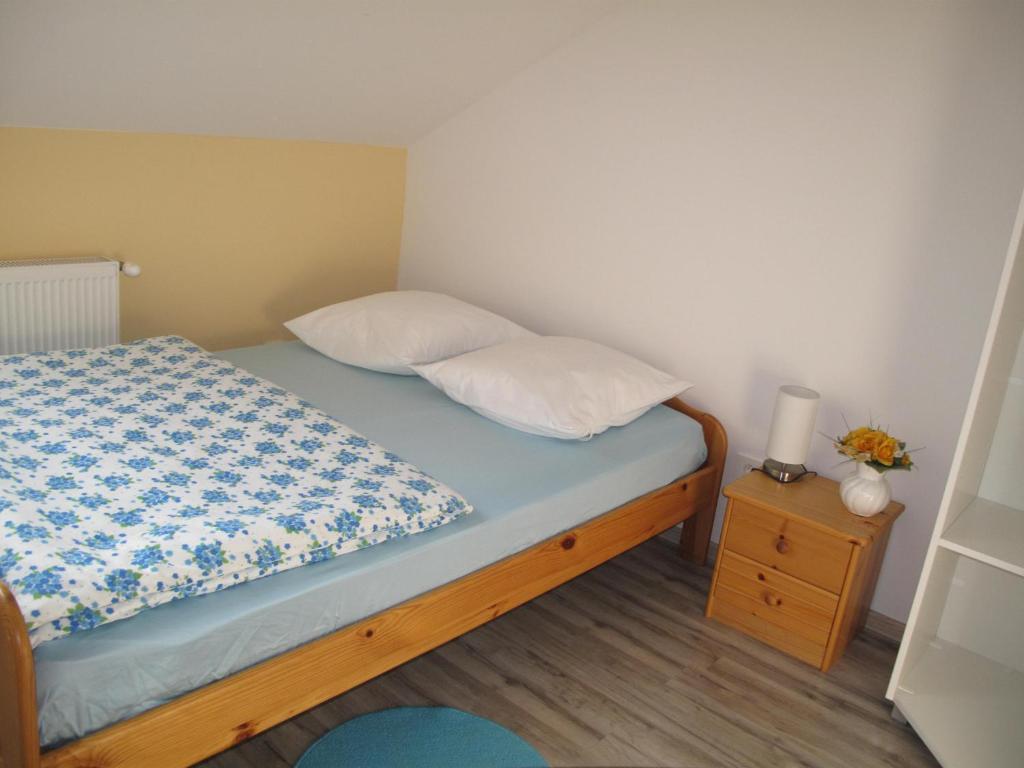 Postel nebo postele na pokoji v ubytování Guesthouse Ursula