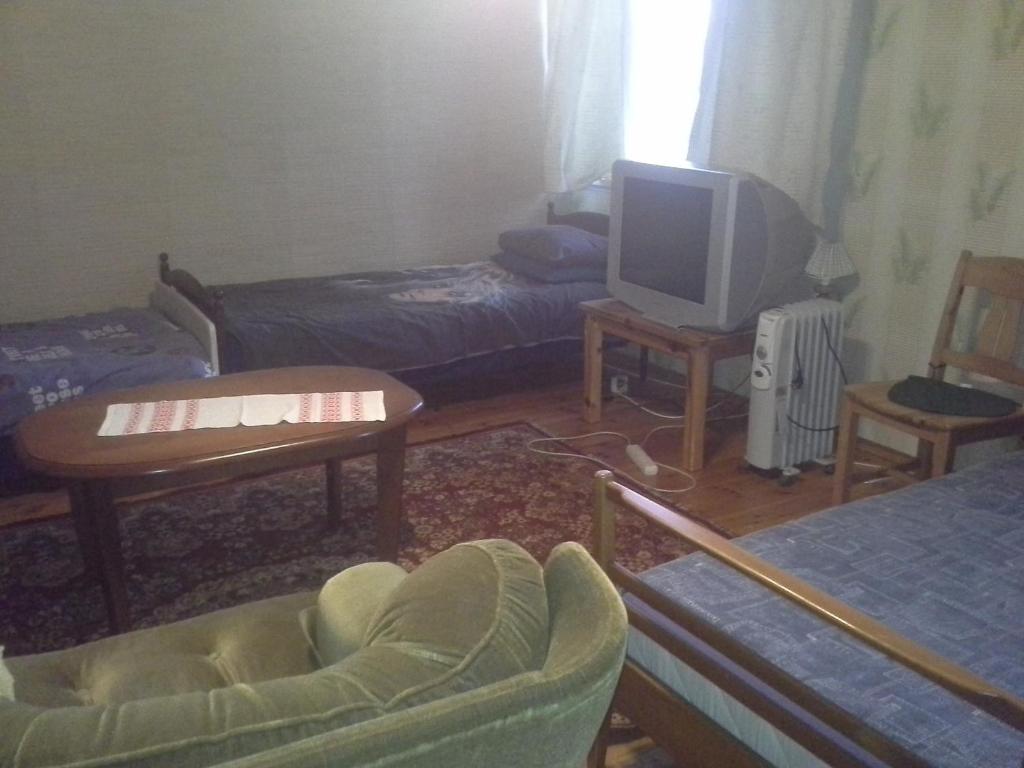 TV a/nebo společenská místnost v ubytování Koidu Homestay