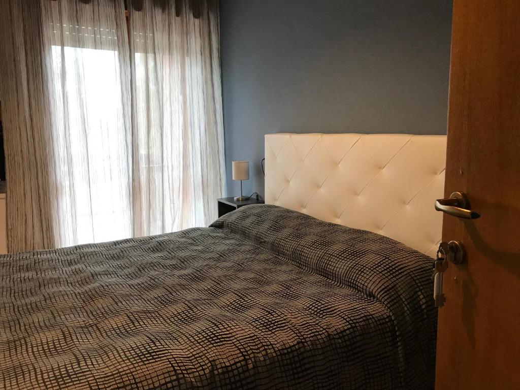 Postel nebo postele na pokoji v ubytování B&B New Triscele