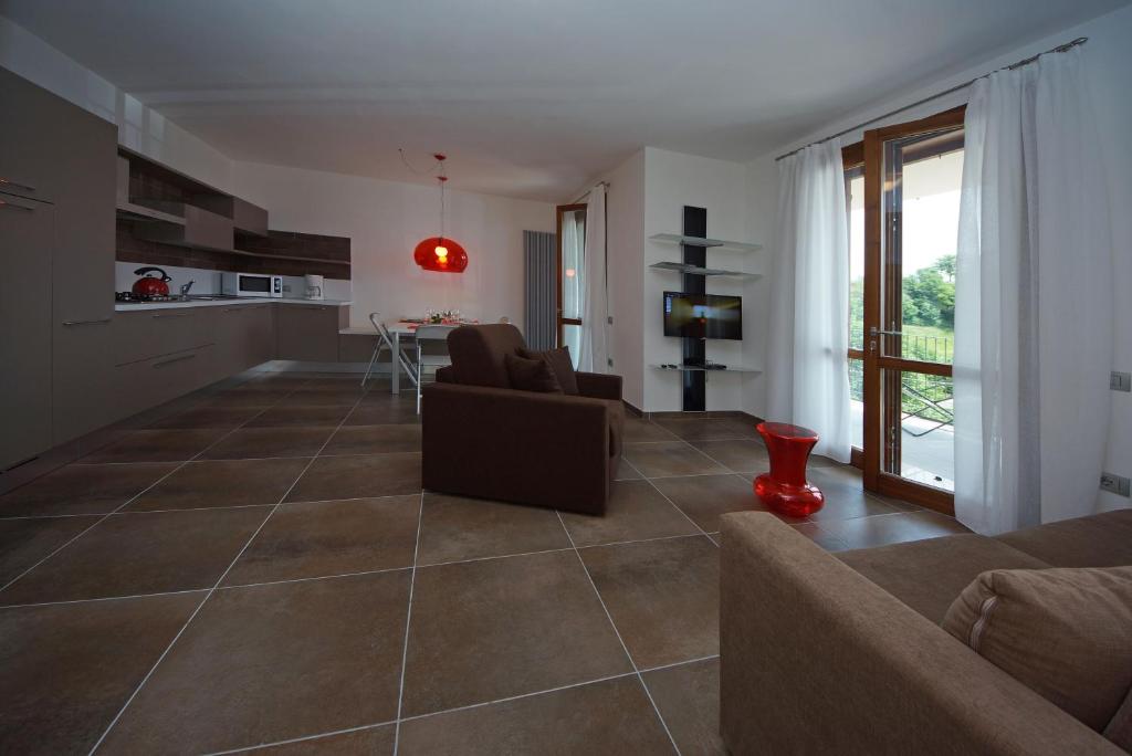 Posezení v ubytování Les Maisons - Ruculì Hospitality